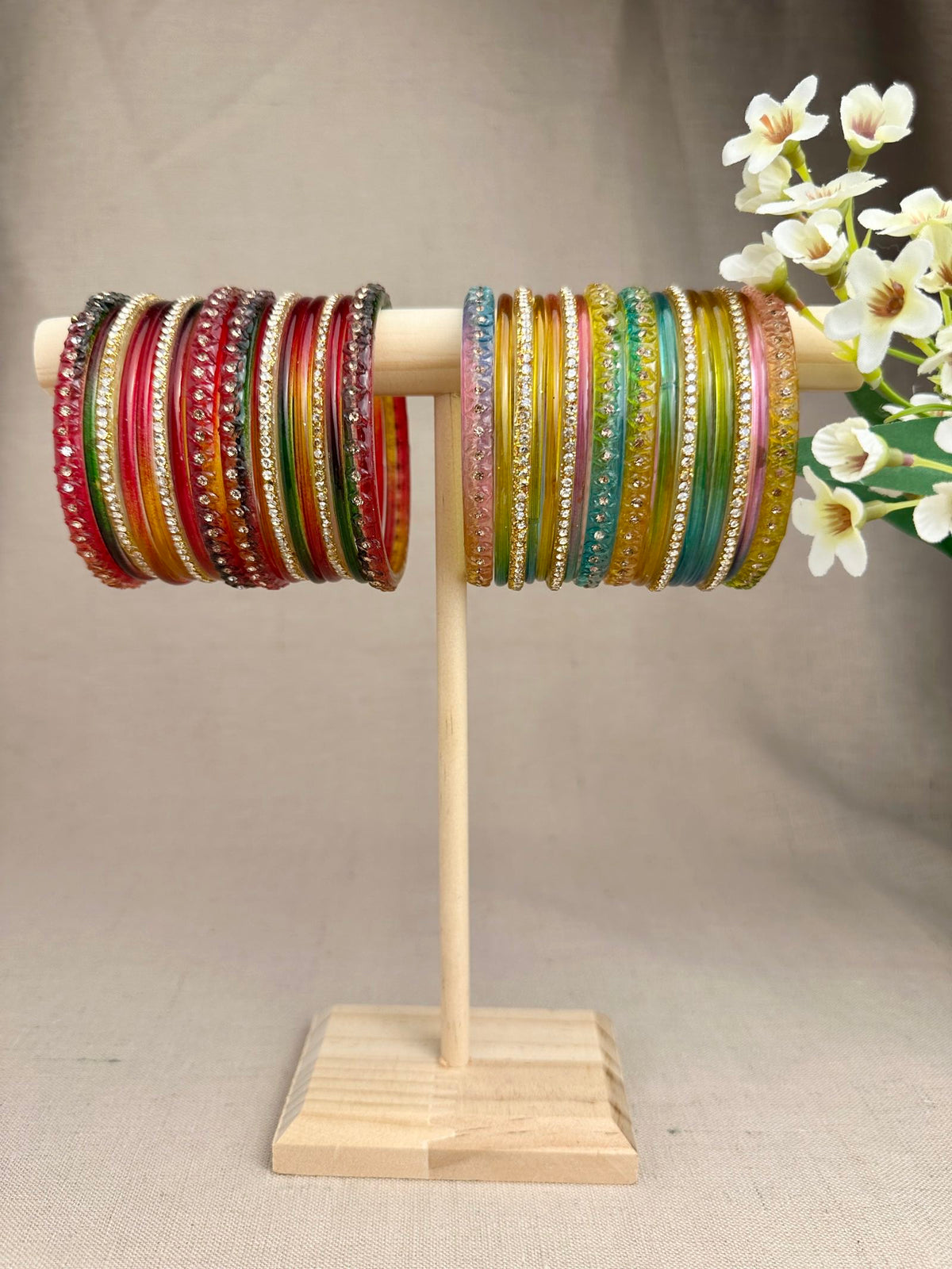 Aabha Multicolour Glass Jelly Bangles Set in Dark Multi and Pastel Multi, featuring 16 bangles per set.