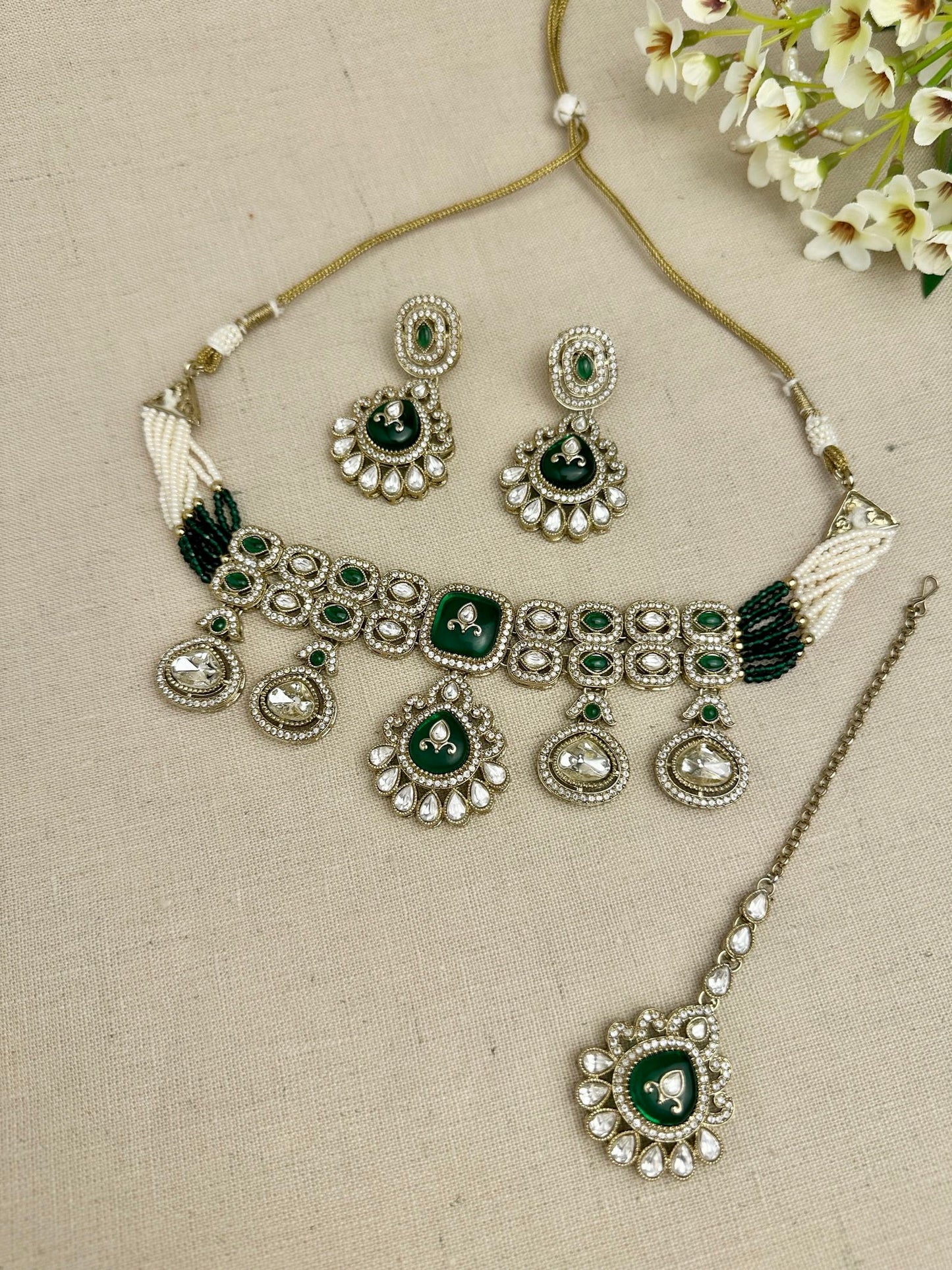 Aarika Heritage Emerald Green kundan choker set with earrings and tikka
