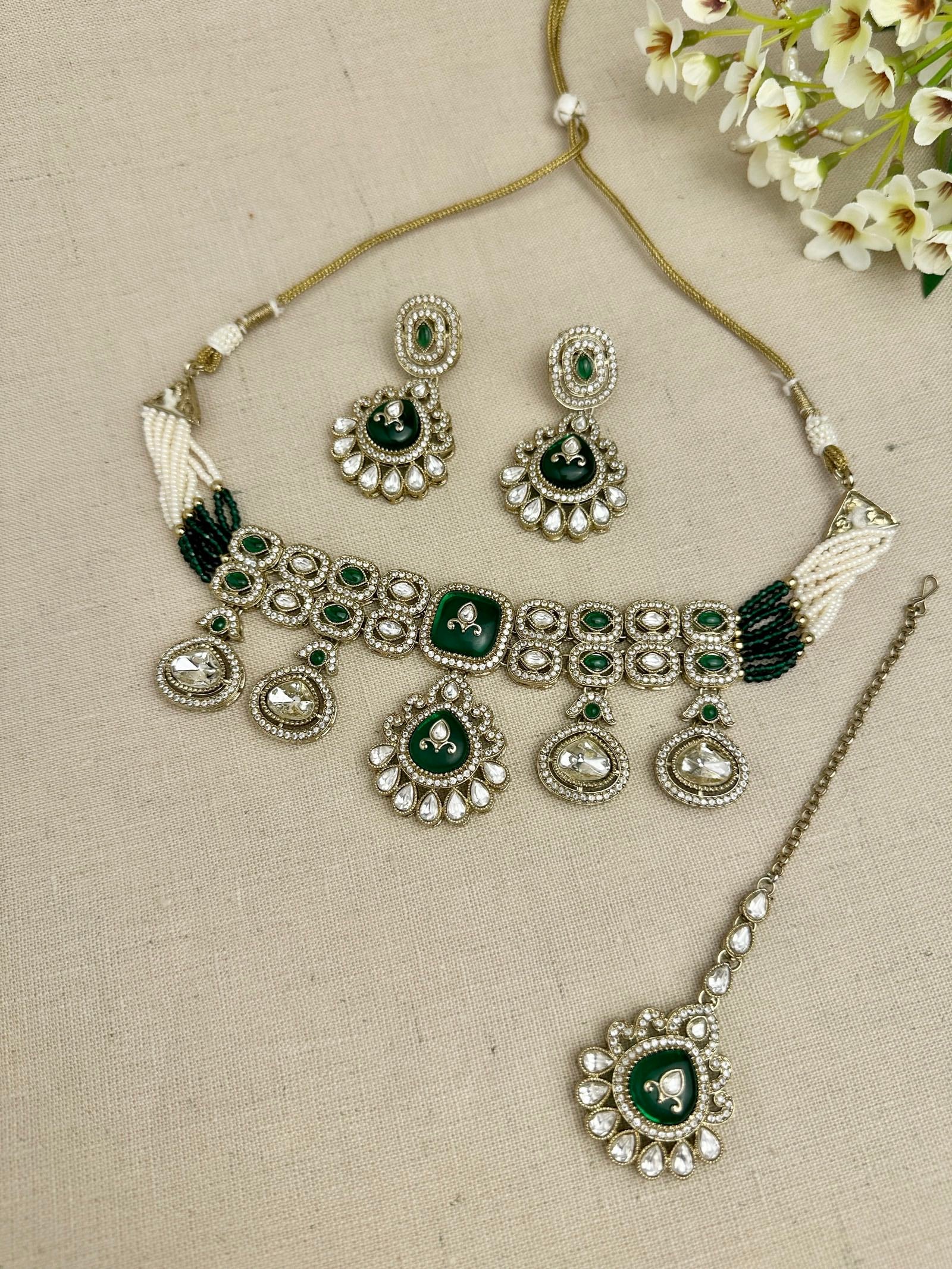 Aarika Heritage Emerald Green kundan choker set with earrings and tikka
