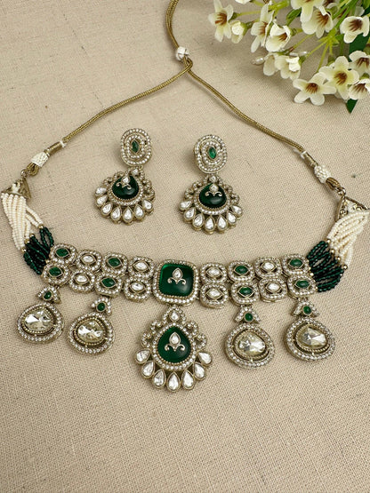 Close-up of Aarika Heritage kundan choker necklace and matching earrings