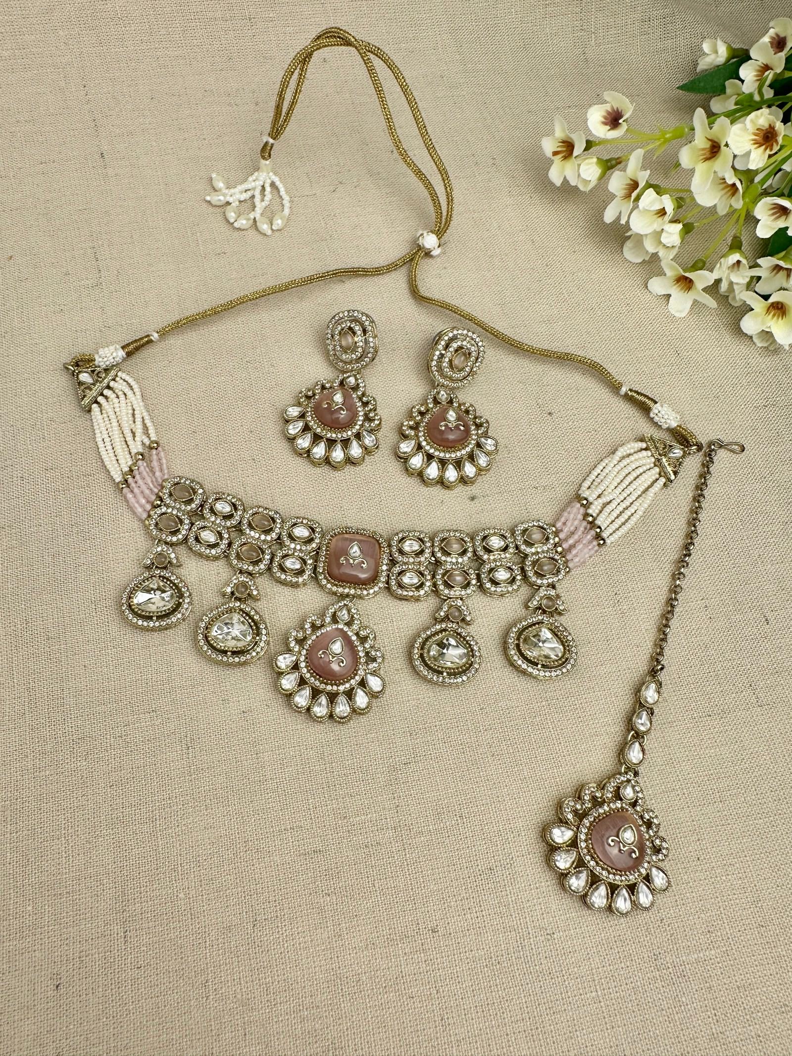 Aarika Heritage Blush Pink kundan choker set with earrings and tikka