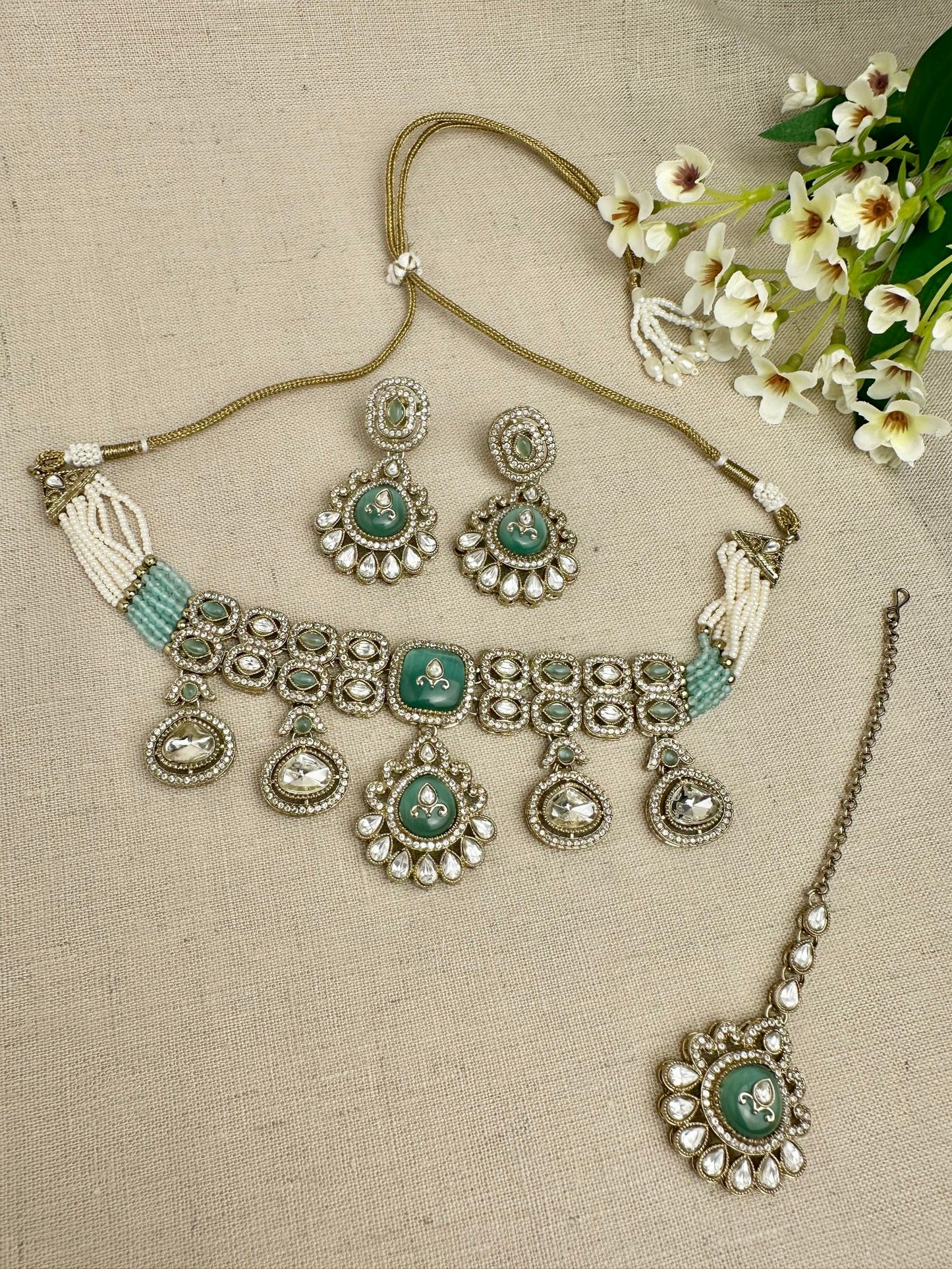 Aarika Heritage Mint Green kundan choker set with earrings and tikka