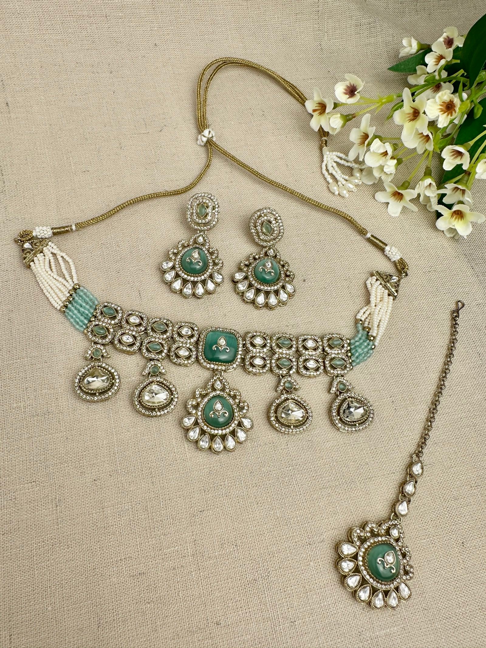 Aarika Heritage Mint Green kundan choker set with earrings and tikka