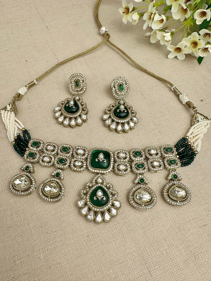 Close-up of Aarika Heritage kundan choker necklace and matching earrings