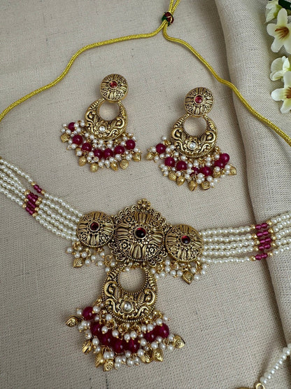     Close-up of Aarohi Ruby antique gold pearl choker necklace