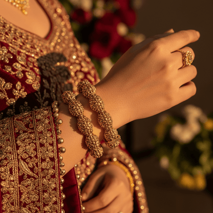 Divyansha antique gold kangan bangles luxury lifestyle shot on wrist