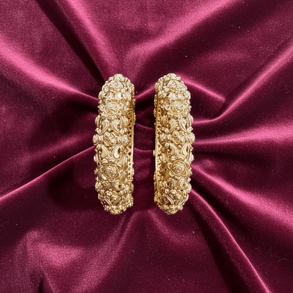 Dripti kangan set on burgundy velvet with elegant draping
