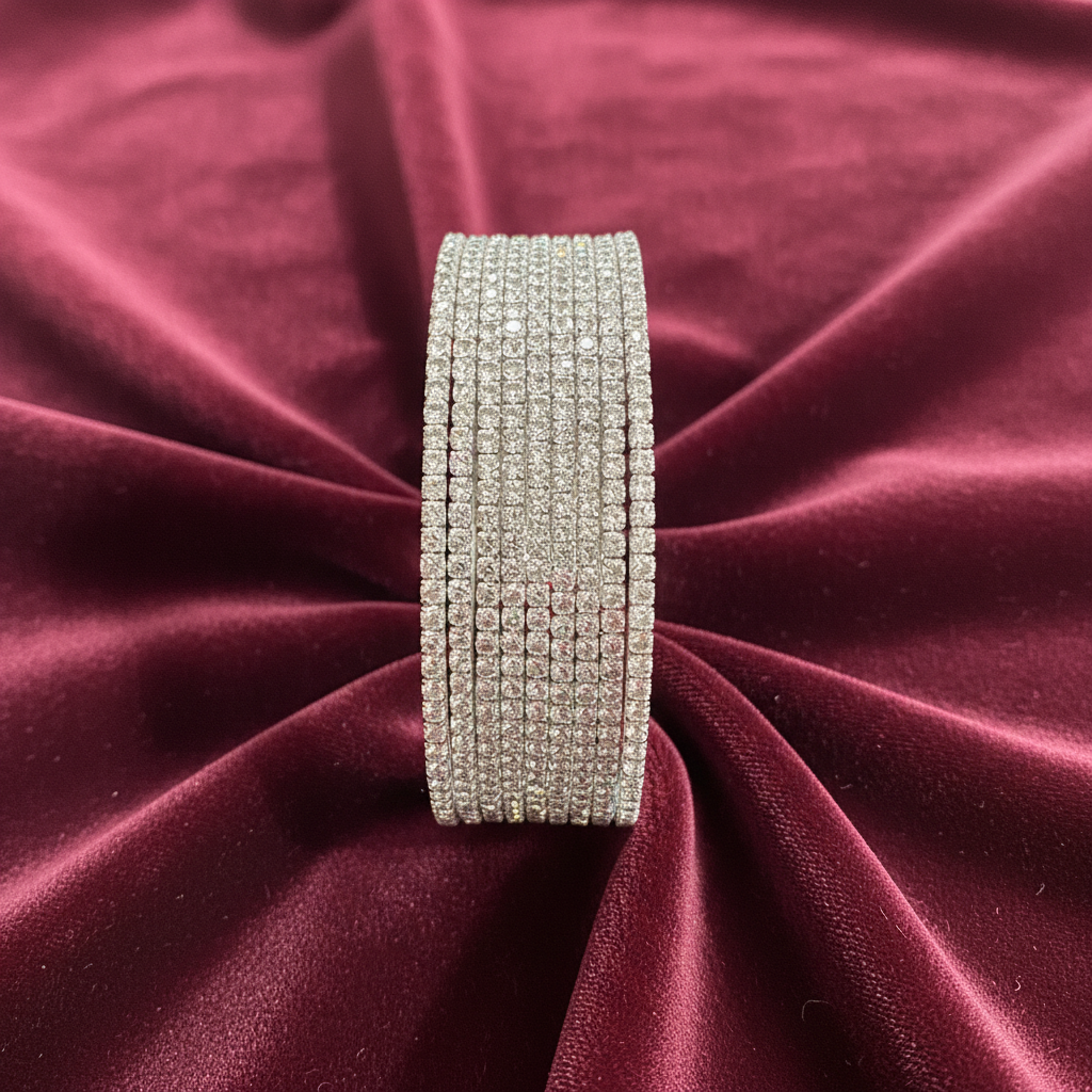 Sophia AD bangle set vertical on burgundy velvet luxury product shot