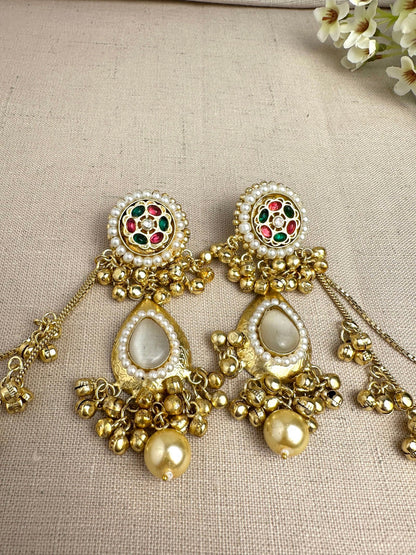     Close-up of Kanika Golden Pachi Kundan earrings with pearl and multicolour stone detailing