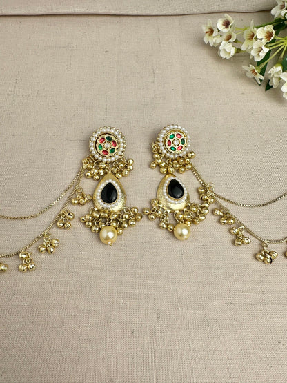     Close-up of Kanika Black Pachi Kundan earrings with pearl detailing