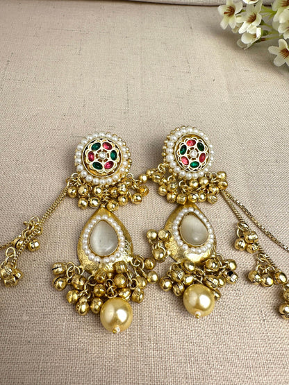     Close-up of Kanika Golden Pachi Kundan earrings with pearl and multicolour stone detailing