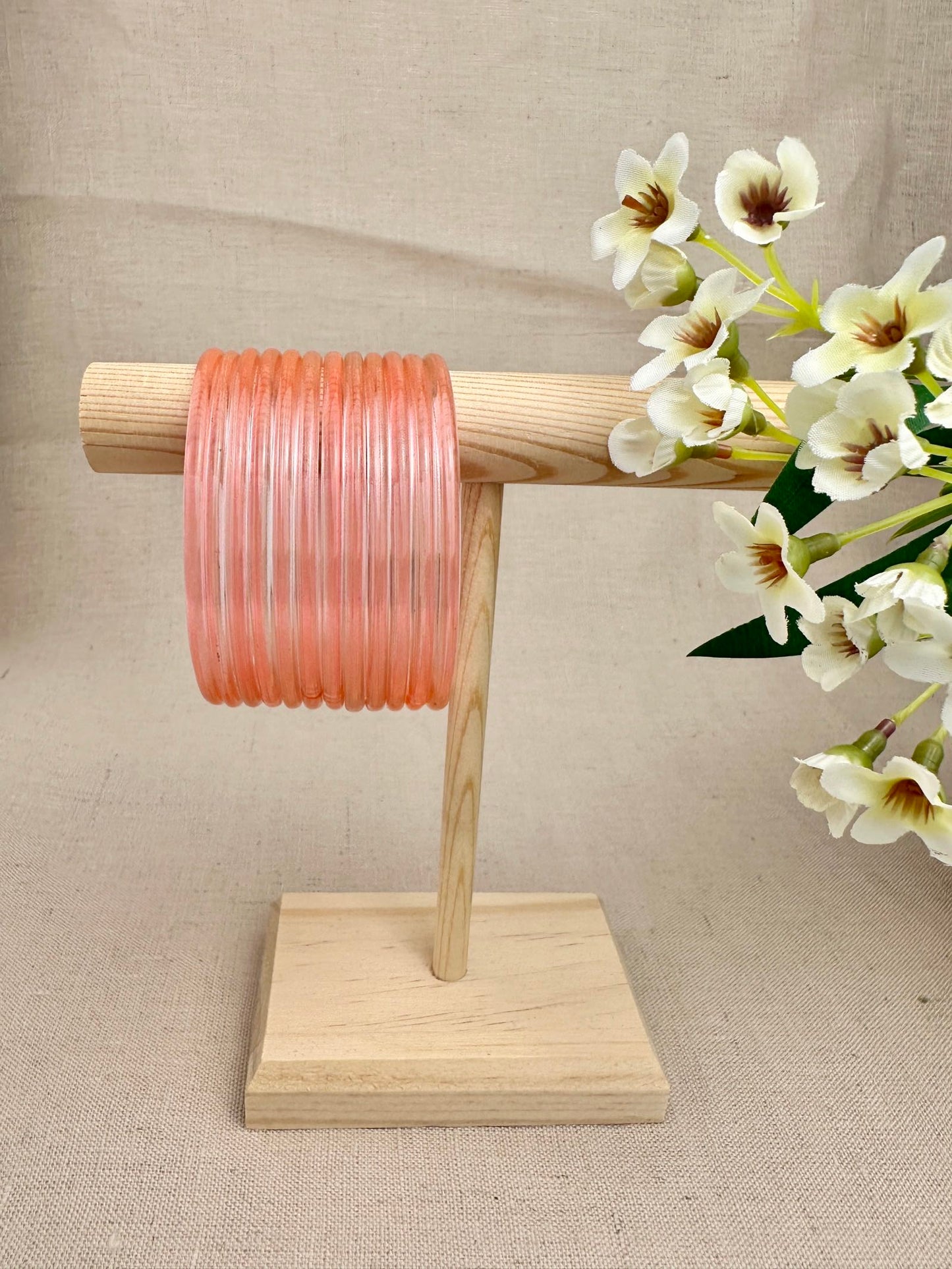 Peach Mayra Jelly Glass Bangles displayed as a set of 12