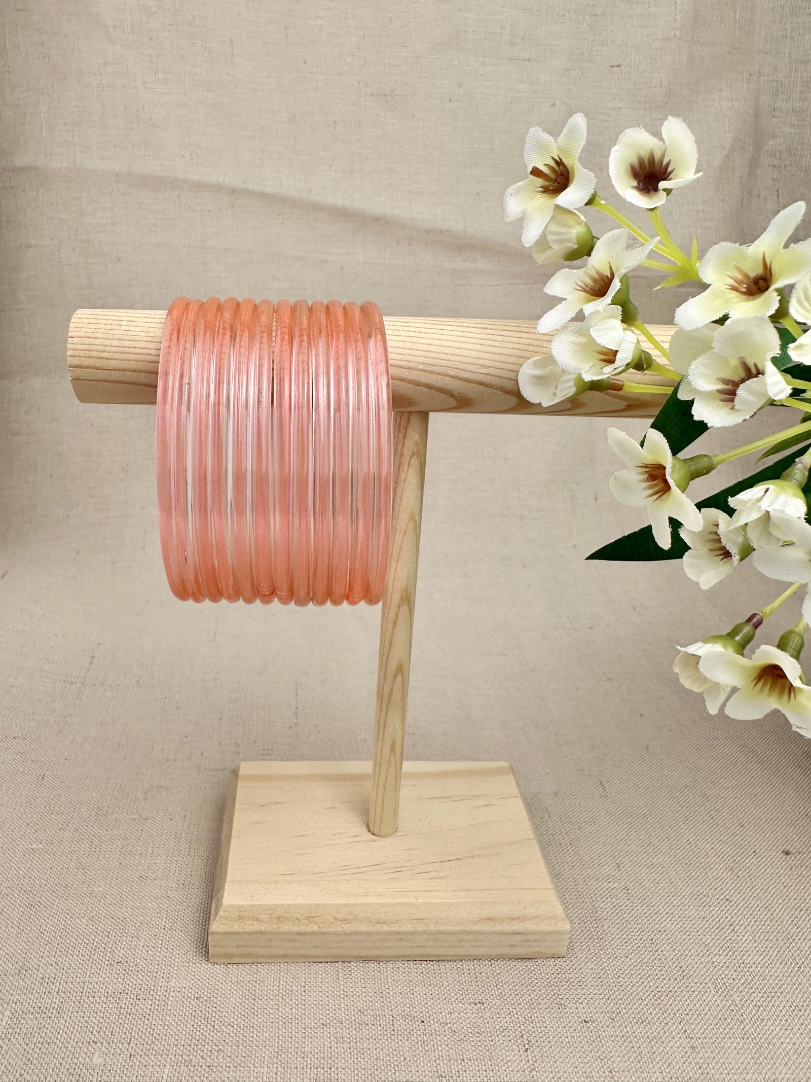 Peach Mayra Jelly Glass Bangles displayed as a set of 12