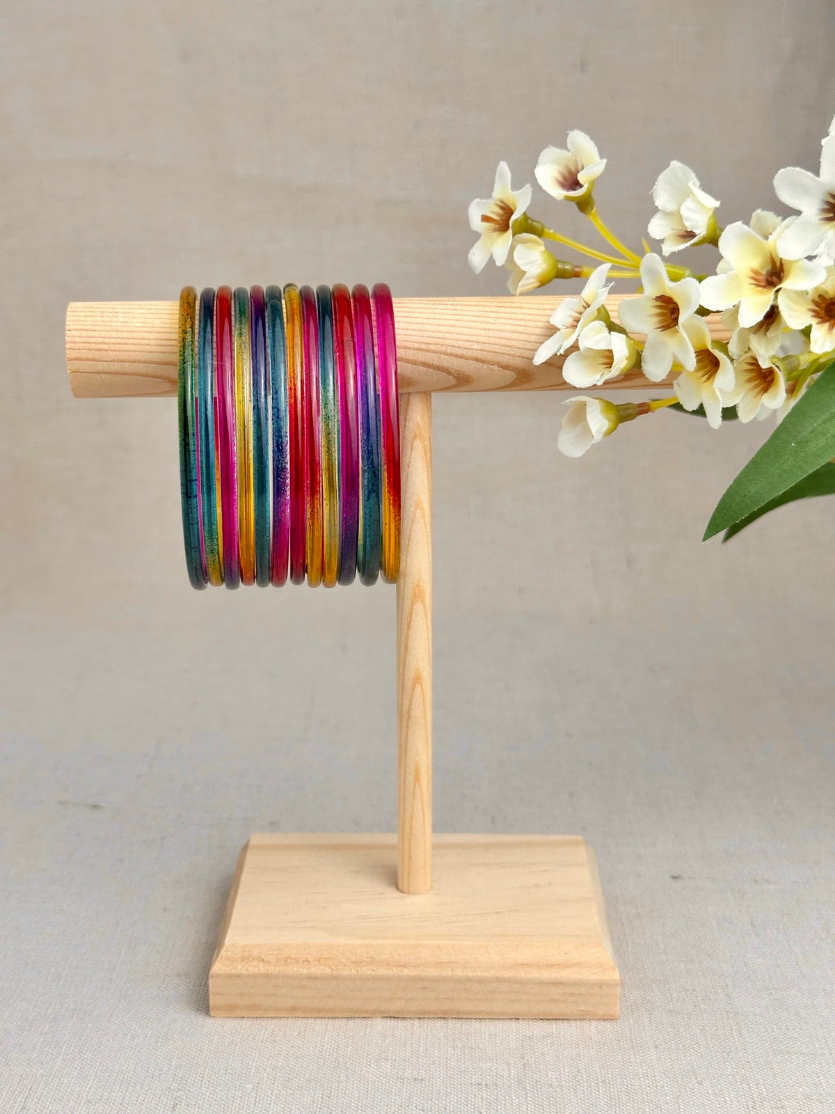 Mayra Dark Multicolor Jelly Bangles featuring vibrant pink, blue, green, purple and golden yellow shades.