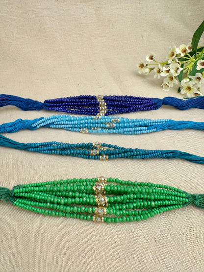 Design 2 single-crystal Rakhi dhagas in assorted blue and green colours