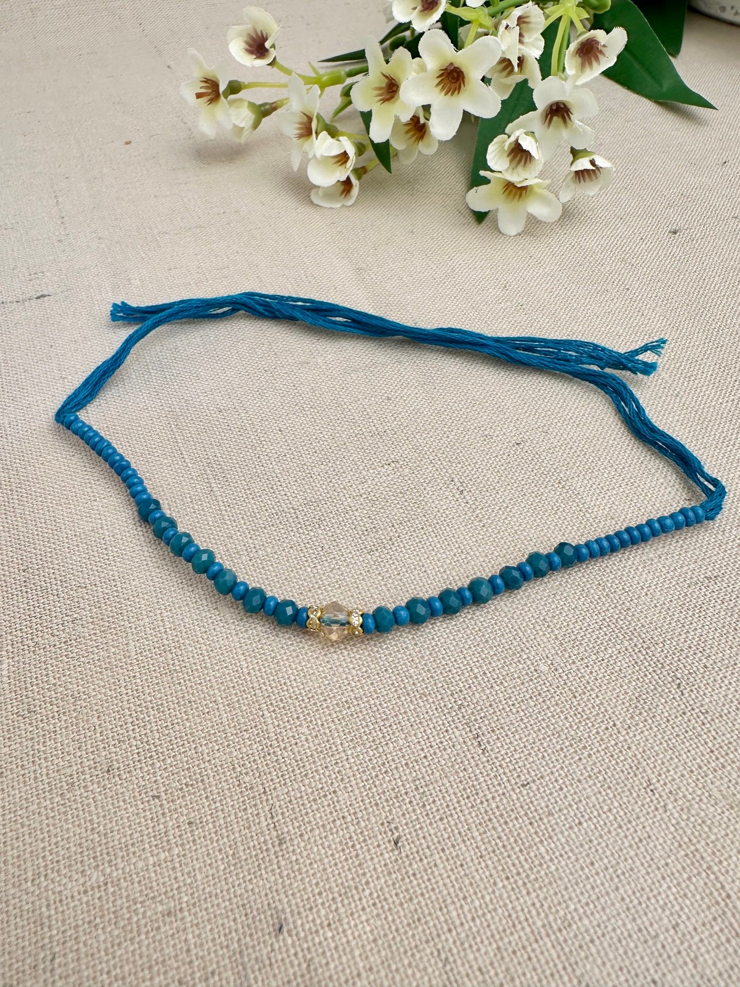 Noor Design 2 blue beaded Rakhi dhaga with one central faceted crystal