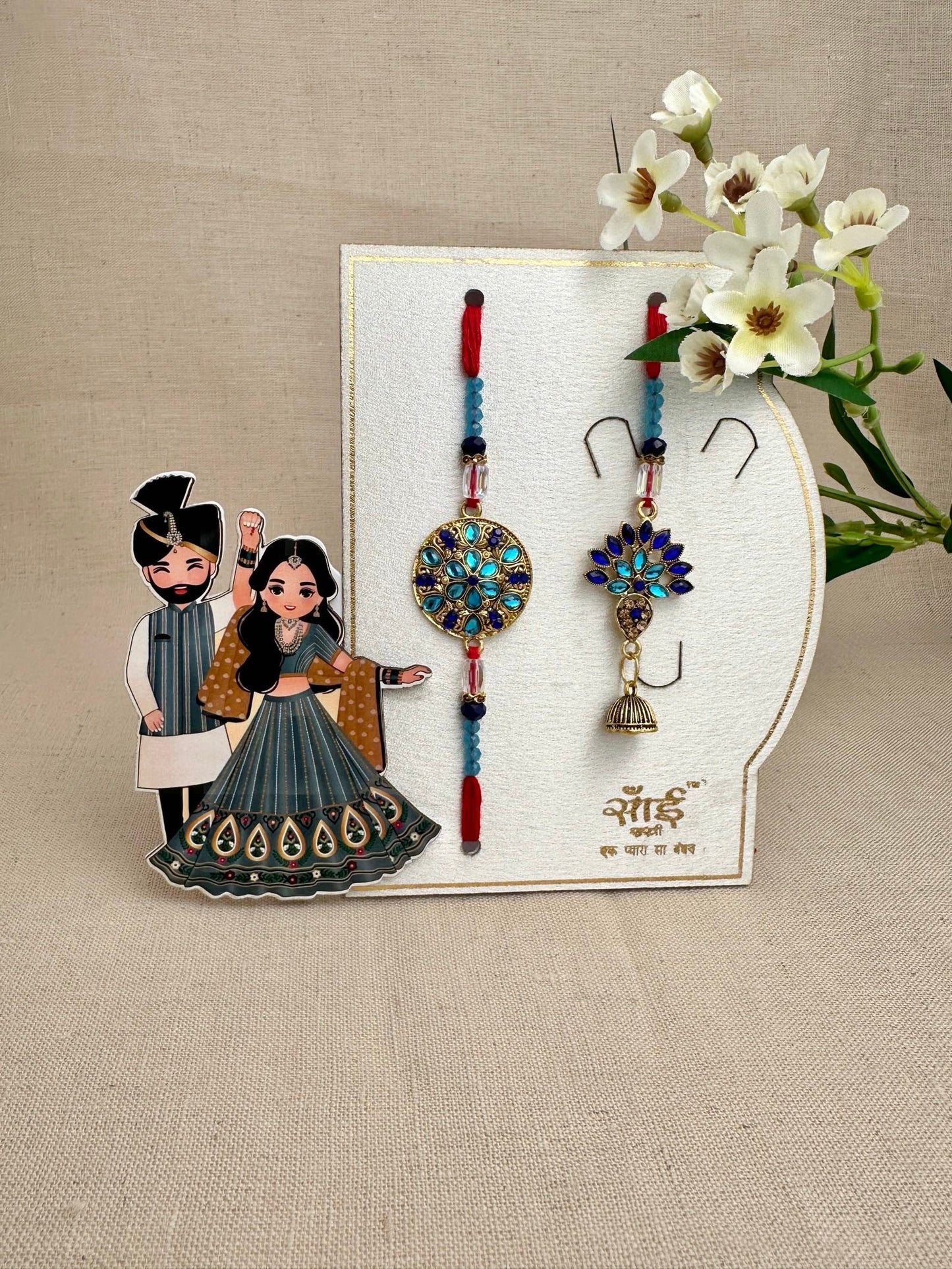 Premium turquoise floral Brother and Bhabhi Rakhi combo with matching jhumka lumba