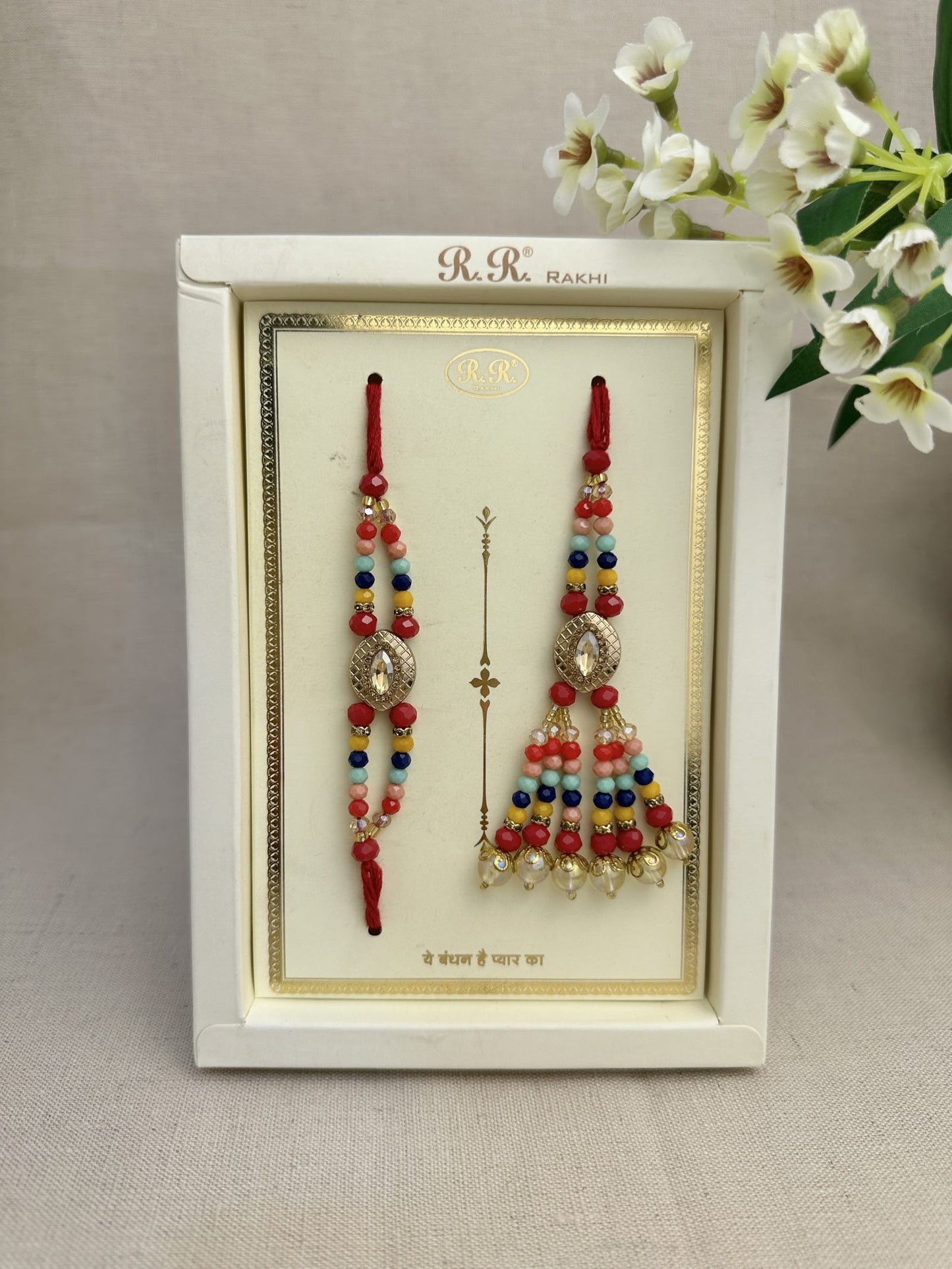 Multicolour crystal Brother and Bhabhi Rakhi combo set