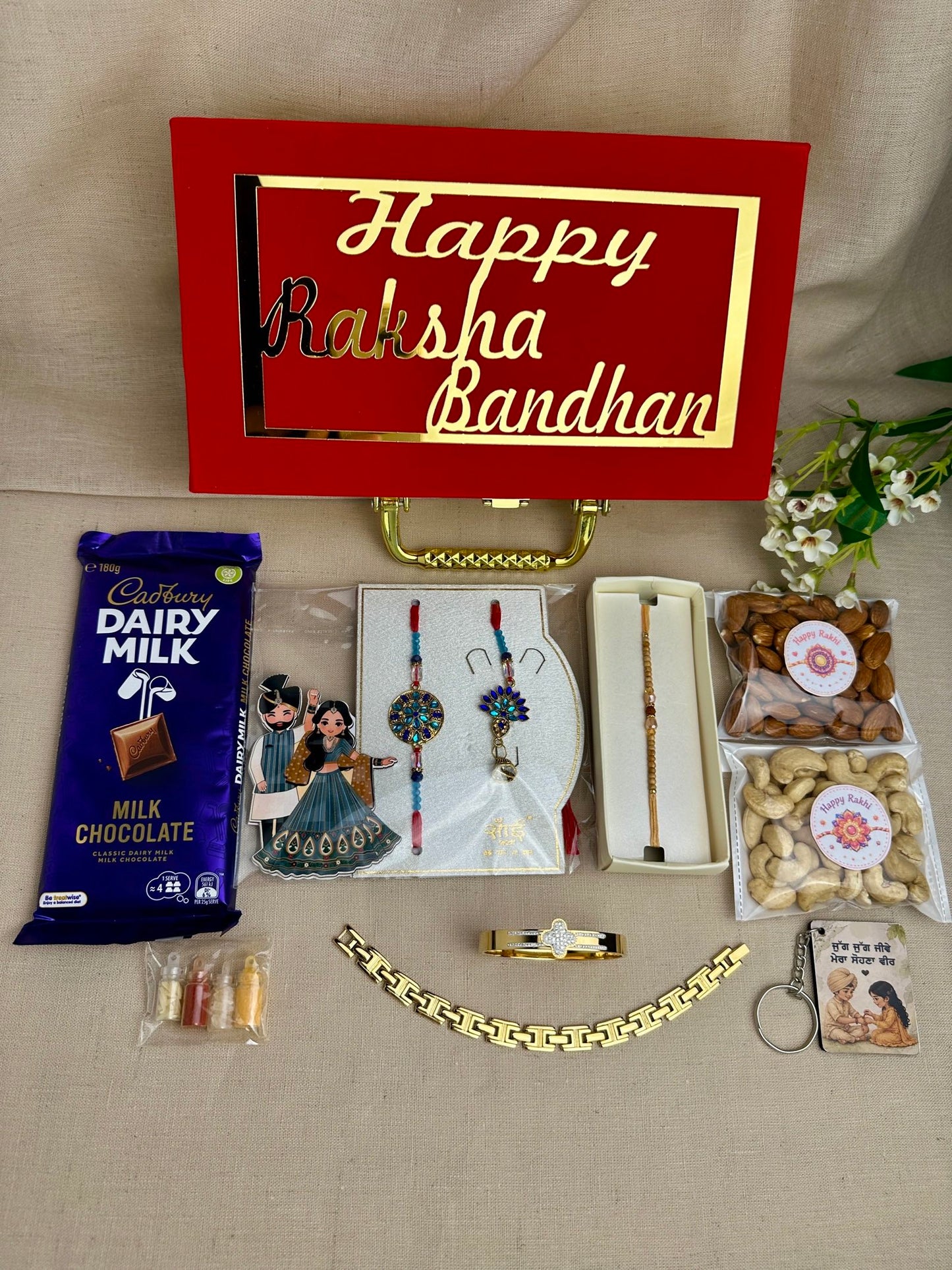 Brother and Bhabhi Rakhi gift box with alternate Rakhi designs.