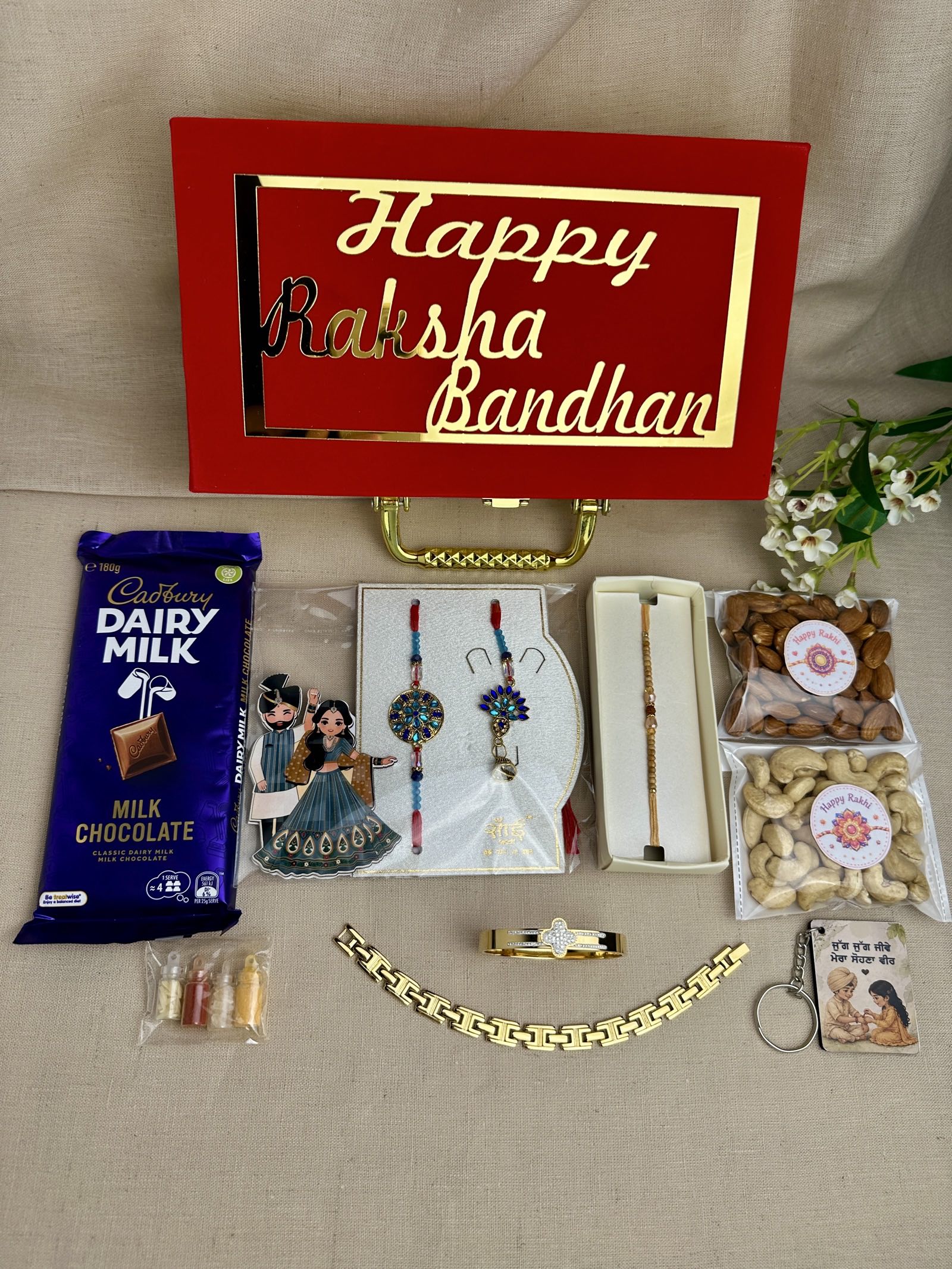 Brother and Bhabhi Rakhi gift box with alternate Rakhi designs.