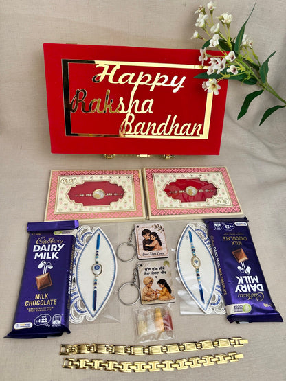 Rakhi gift box for multiple brothers with Rakhis, gold-plated bracelets, keychains, chocolates, tikka and reusable red box