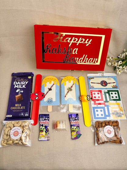 Rakhi Gift Box for 2 children with kids’ Rakhis, chocolates, dry fruits and festive gifts.
