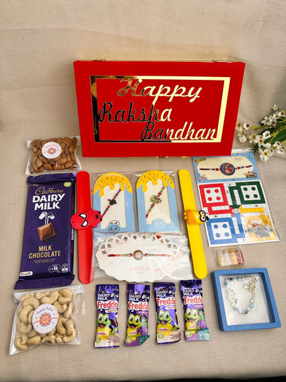 Rakhi Gift Box for 4 children with age-appropriate Rakhis, chocolates, dry fruits and festive gifts.