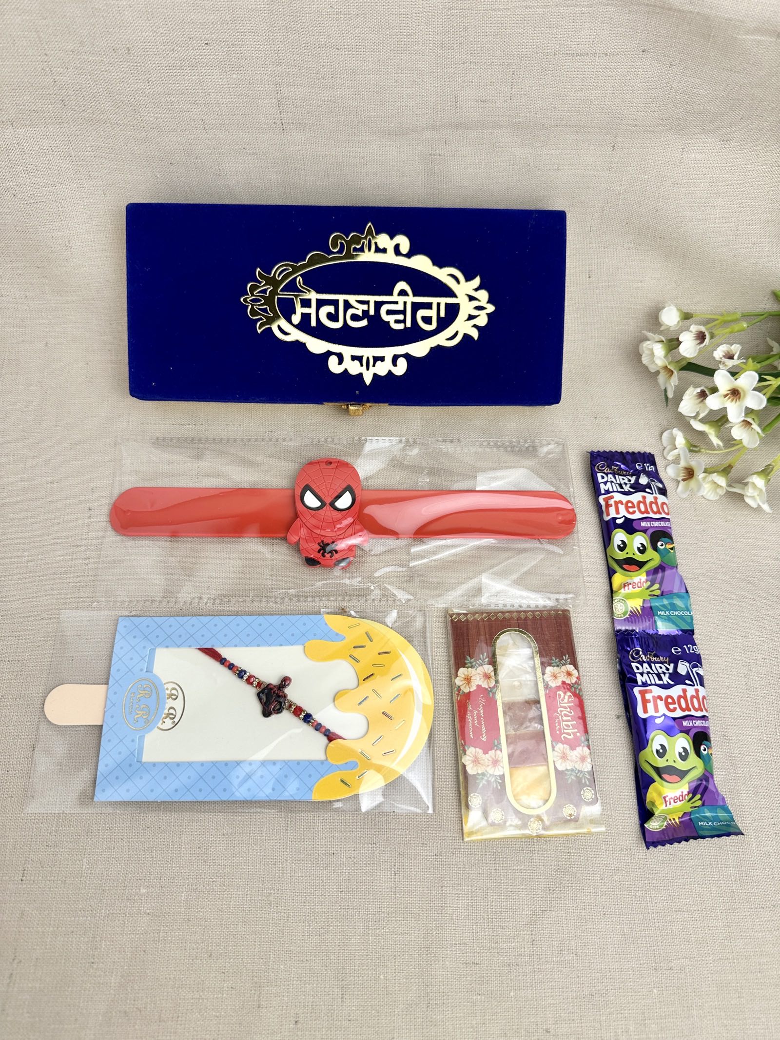     Rakhi Gift Box for child age 6 to 10 with character snap band