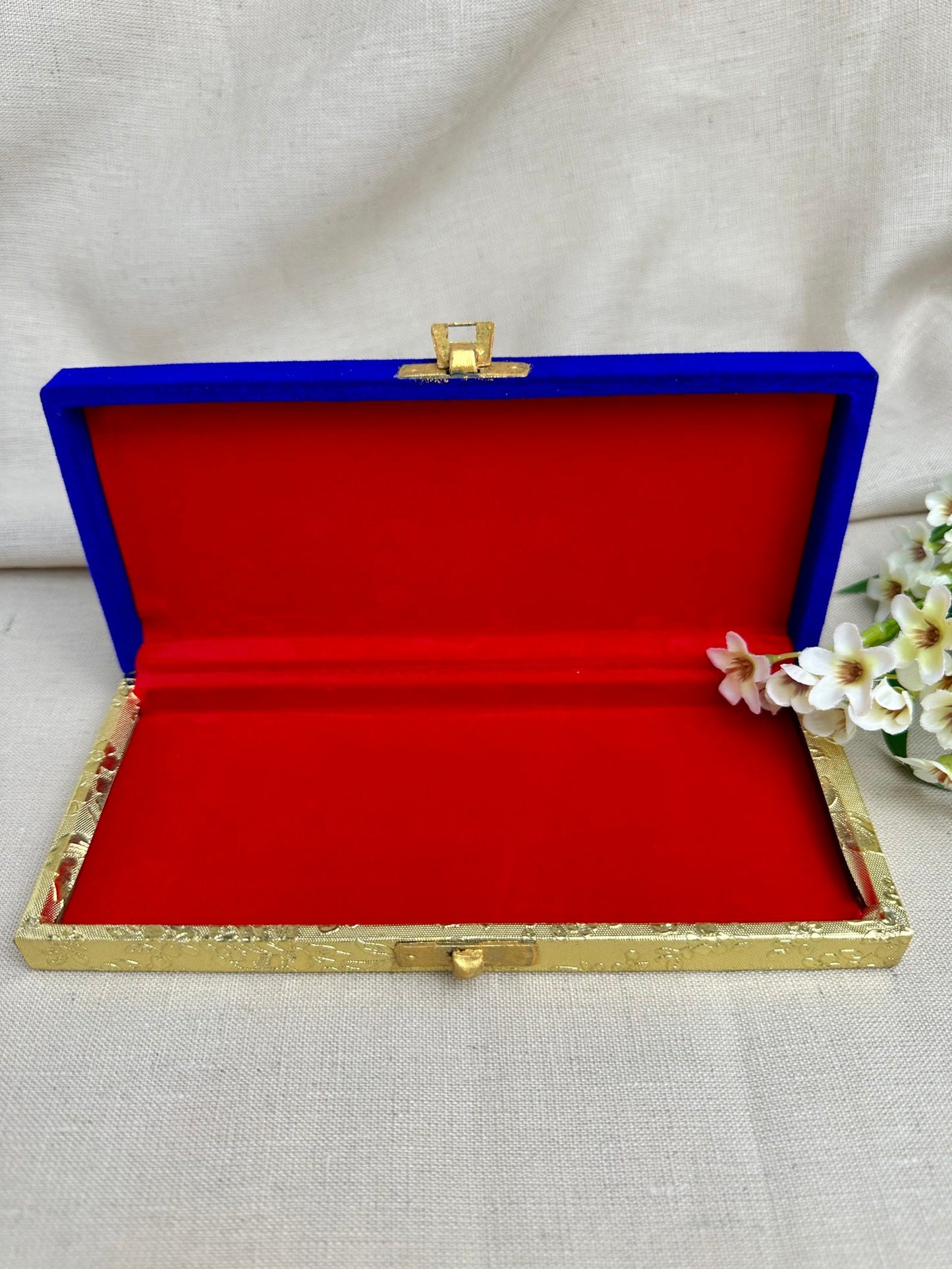     Open Rakhi gift box with Rakhi chocolates tikka and child gift