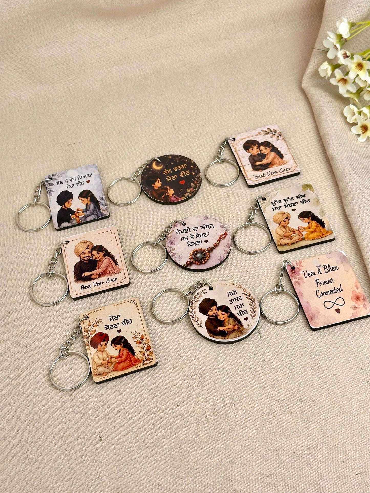 Raksha Bandhan keychain designs for brothers with Punjabi and English sibling messages