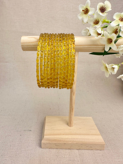 Ruhani Raindrop Glass Bangles in Amber Gold