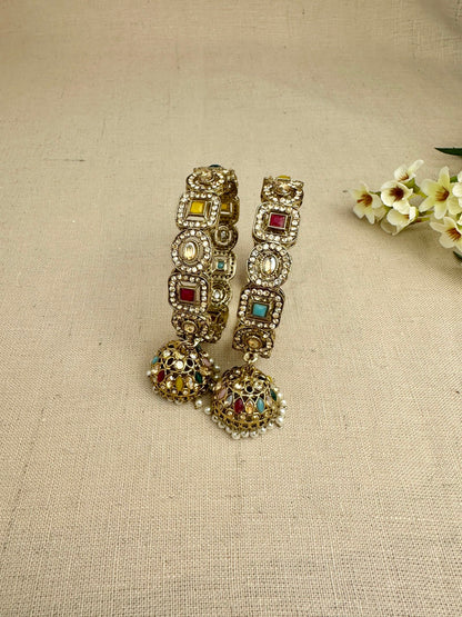Close view of Saanjh Multicolour kangans with pearl detailing and jhumkis