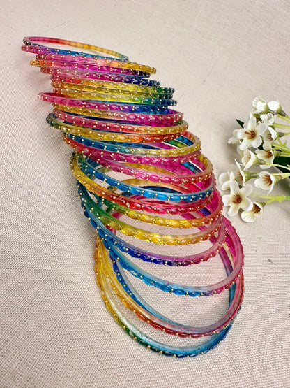     Stacked view of colourful Water Drop glass bangles in a set of 24