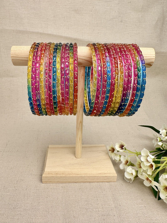     Water Drop multicolour glass bangles in size 2.12, set of 24 displayed on a wooden stand