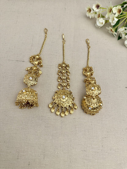 Side view of the Simran Gold-Plated Punjabi Jhumki & Tikka Set highlighting the single jhumki design and sahara chain.